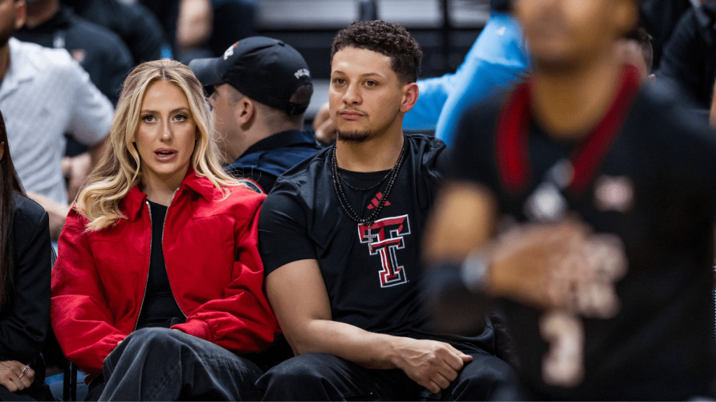 Brittany Mahomes and Patrick Mahomes look on during the second half of the game between the Houston Cougars and the Texas Tech Red Raiders at United Supermarkets Arena on February 24, 2025 in Lubbock, Texas.